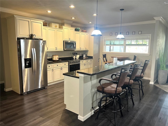 kitchen with dark wood-style floors, pendant lighting, stainless steel appliances, ornamental molding, and a kitchen island