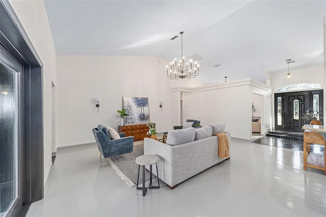 living area featuring baseboards, high vaulted ceiling, visible vents, and a notable chandelier