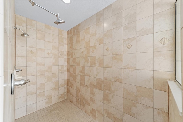 bathroom featuring tiled shower