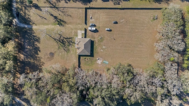 birds eye view of property featuring a rural view