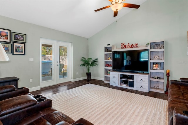 living room featuring dark wood-style floors, french doors, lofted ceiling, a ceiling fan, and baseboards