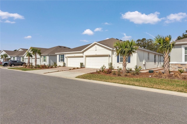 single story home with a garage