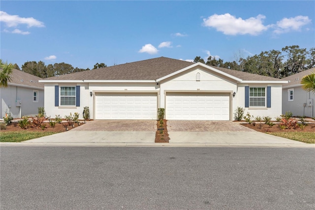 ranch-style home with a garage