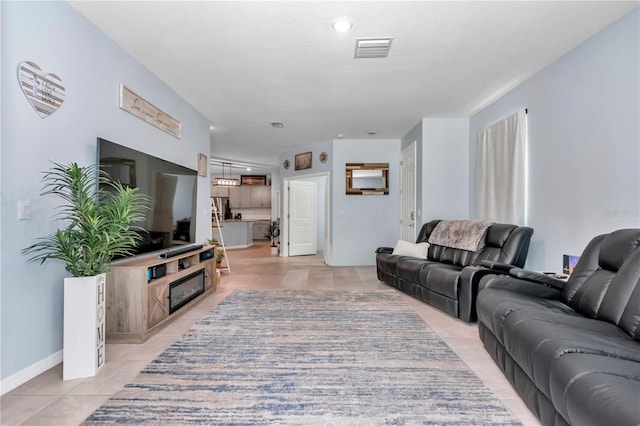 living room featuring light tile patterned floors