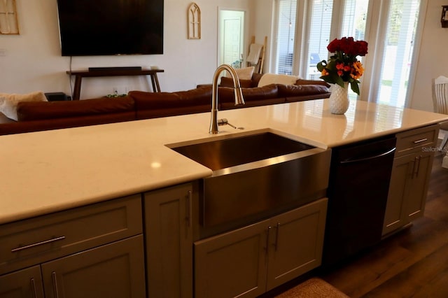 kitchen with dishwasher, sink, gray cabinetry, and dark hardwood / wood-style floors