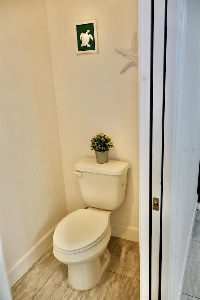 bathroom featuring toilet