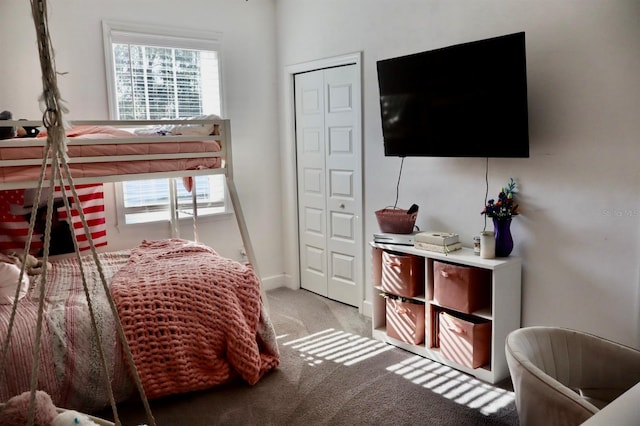 bedroom featuring light colored carpet