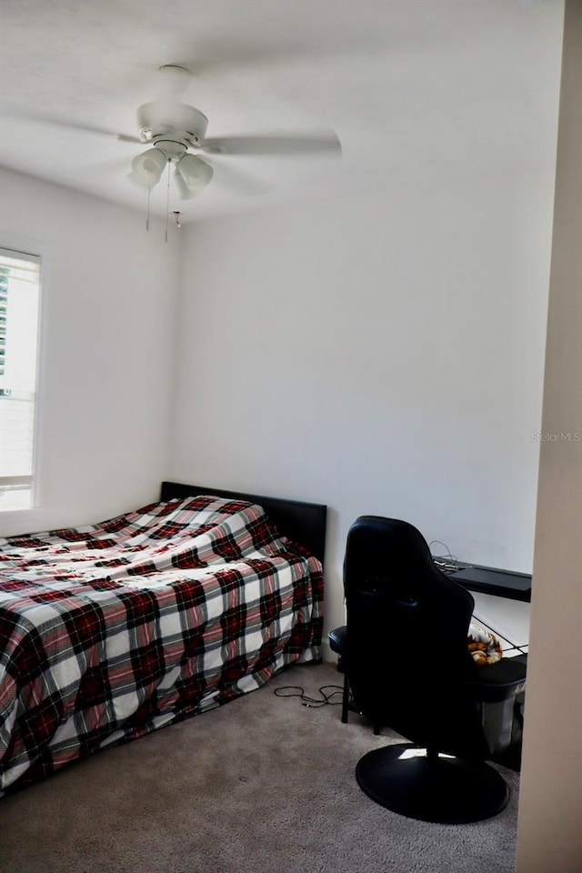 bedroom with carpet floors and ceiling fan