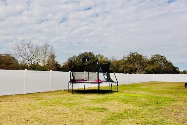 view of yard featuring a trampoline