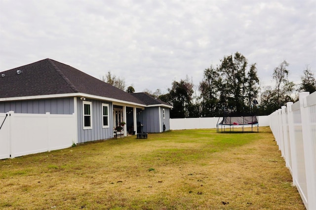 view of yard featuring a trampoline