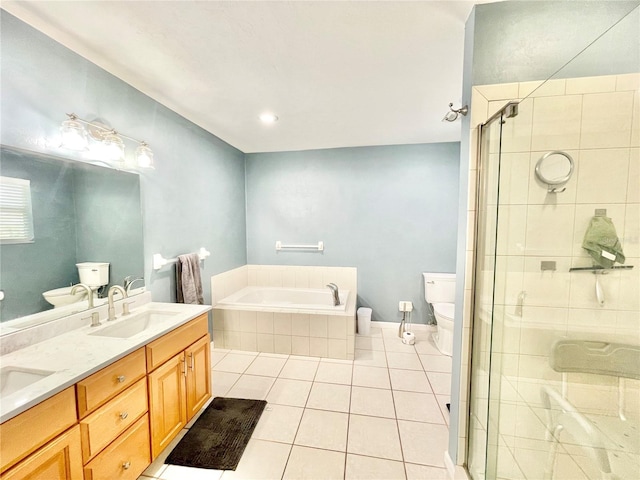 full bathroom featuring tile patterned flooring, vanity, independent shower and bath, and toilet