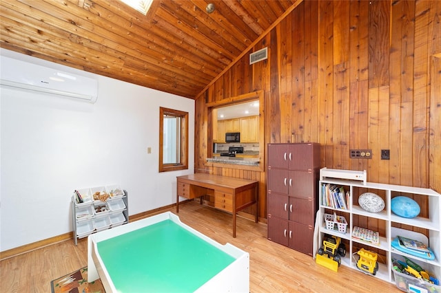 playroom featuring visible vents, an AC wall unit, vaulted ceiling, wood finished floors, and wooden ceiling