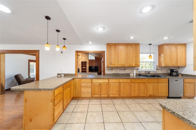 kitchen featuring recessed lighting, a sink, hanging light fixtures, and stainless steel dishwasher