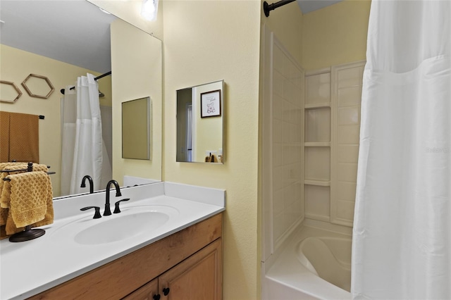 full bathroom featuring shower / bath combo and vanity