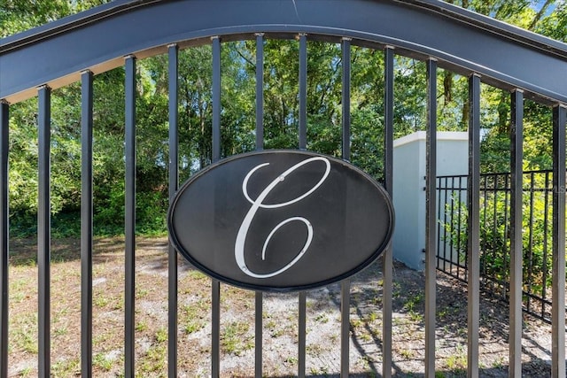 view of gate featuring fence