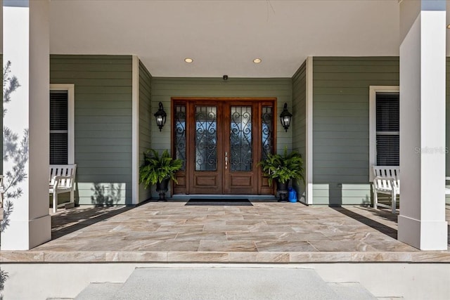 entrance to property featuring french doors