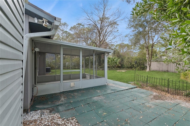 view of patio / terrace with a sunroom