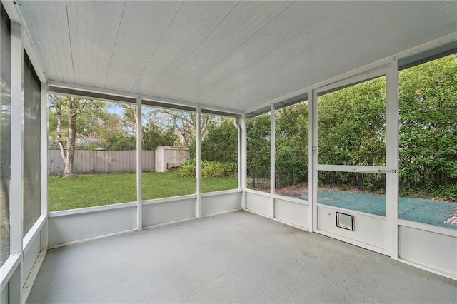 unfurnished sunroom featuring plenty of natural light