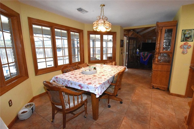 dining room with tile patterned flooring