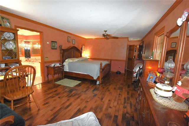 bedroom featuring ornamental molding, a notable chandelier, and dark hardwood / wood-style flooring