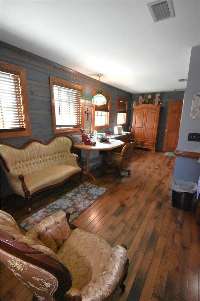 living room with dark hardwood / wood-style flooring