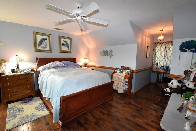 bedroom with lofted ceiling, dark wood-type flooring, and ceiling fan