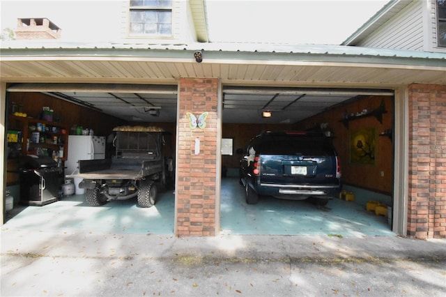 garage featuring white refrigerator