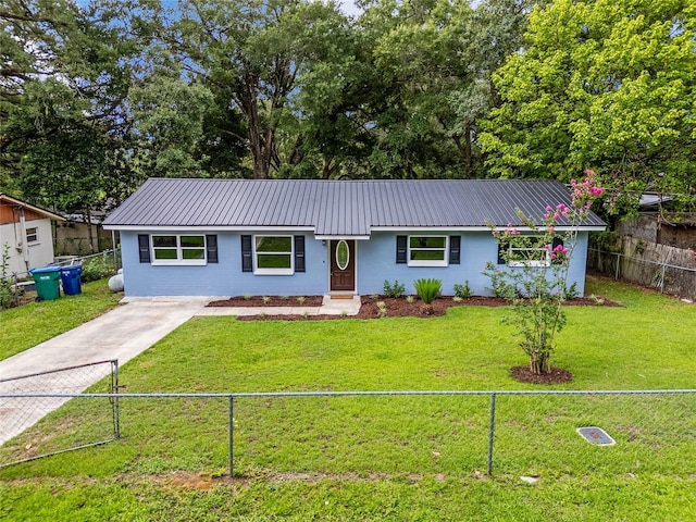 ranch-style home featuring a front yard