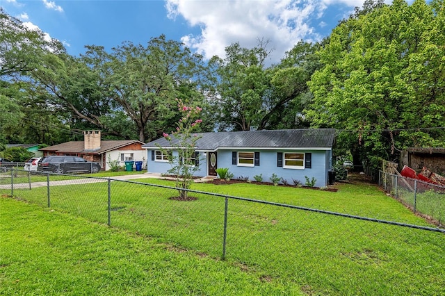 single story home with a front lawn