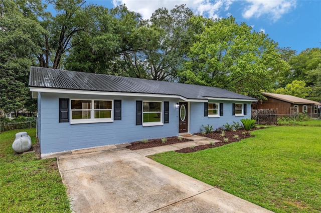 ranch-style house with a front yard