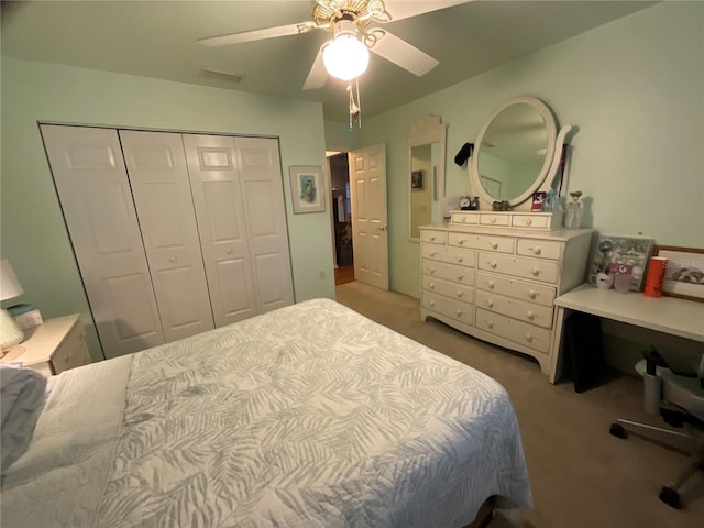 bedroom featuring ceiling fan, carpet floors, and a closet