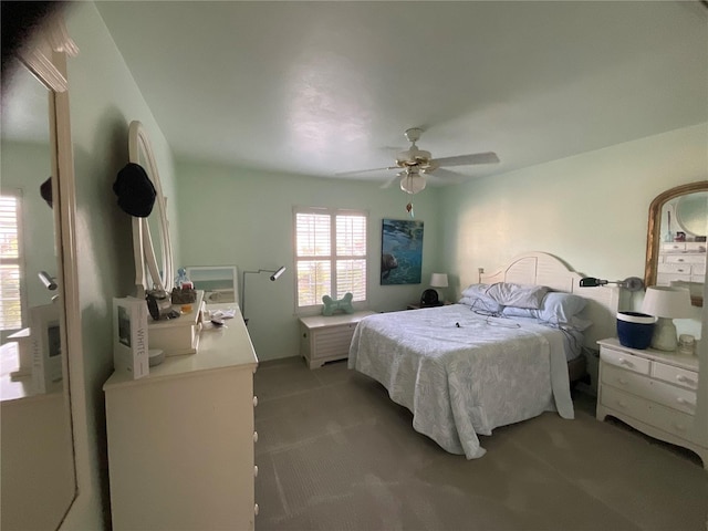 bedroom featuring a ceiling fan and carpet flooring
