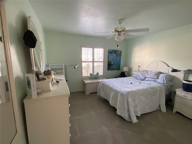 carpeted bedroom with a ceiling fan