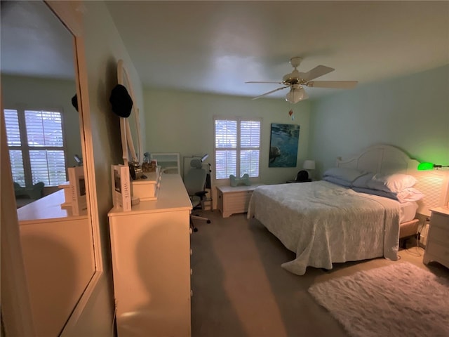 carpeted bedroom with a ceiling fan