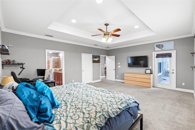 bedroom featuring visible vents, baseboards, crown molding, a raised ceiling, and carpet flooring