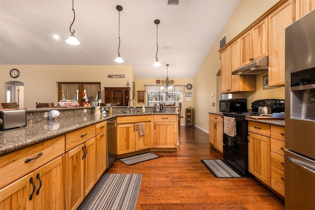 kitchen featuring dark wood-style floors, visible vents, hanging light fixtures, black appliances, and under cabinet range hood