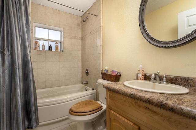 bathroom with shower / tub combo with curtain, vanity, and toilet