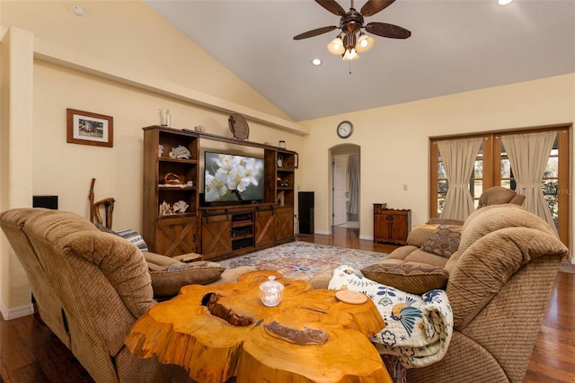 living room featuring wood finished floors, recessed lighting, arched walkways, ceiling fan, and vaulted ceiling