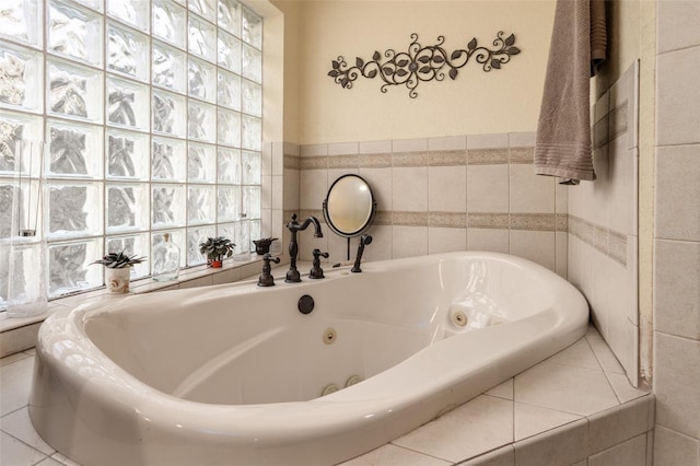 bathroom with a whirlpool tub