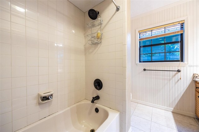 full bathroom featuring tile patterned floors, vanity, baseboards, and shower / bathtub combination