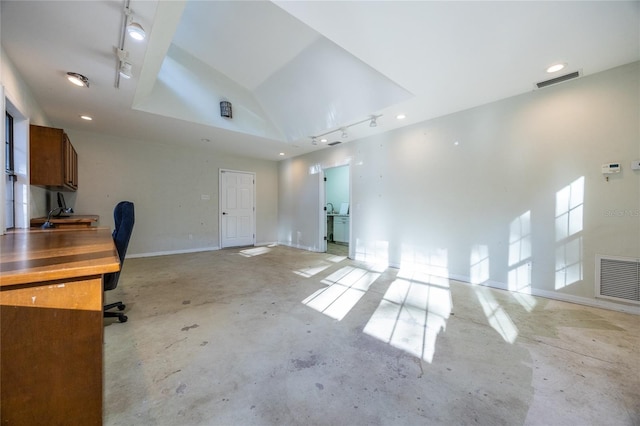 unfurnished office featuring baseboards, concrete floors, visible vents, and recessed lighting