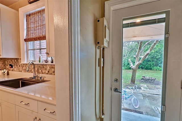 entryway with a sink