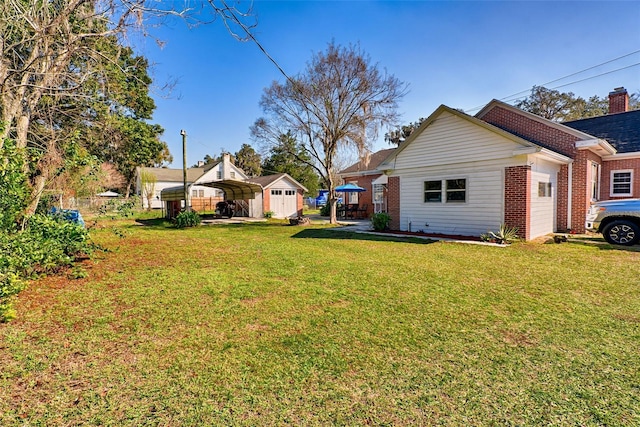 view of yard with a carport