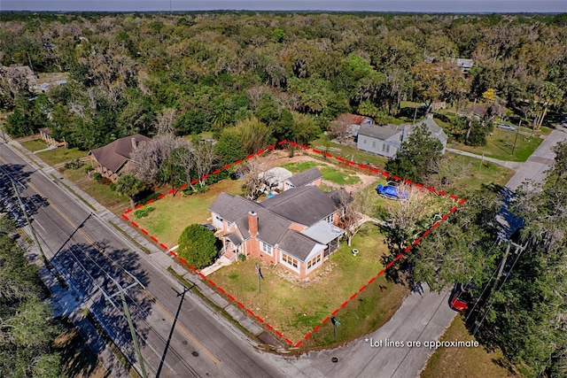 aerial view with a wooded view