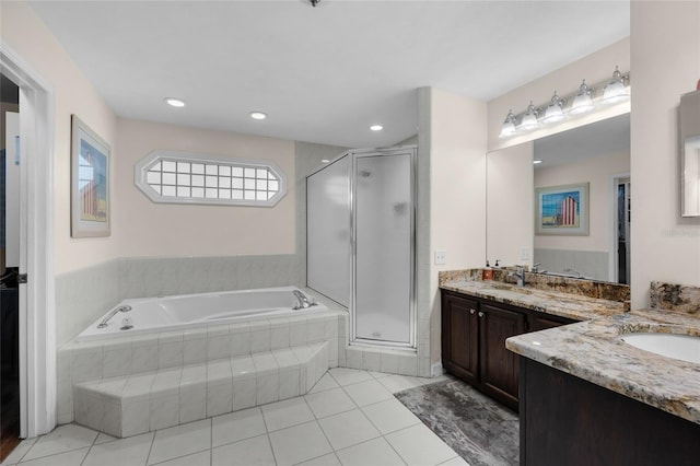 full bathroom featuring a garden tub, a stall shower, recessed lighting, tile patterned flooring, and vanity