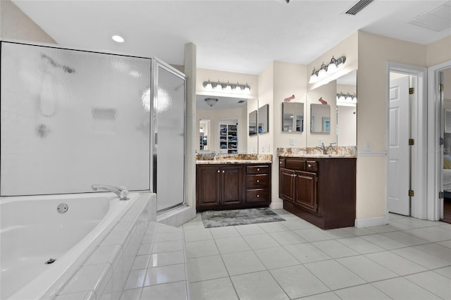 full bath featuring tile patterned flooring, a shower stall, a garden tub, and visible vents