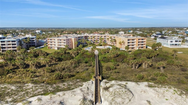 birds eye view of property with a city view