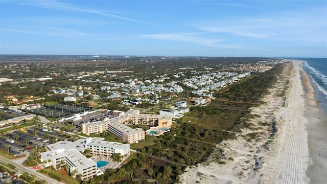 bird's eye view with a water view and a view of the beach