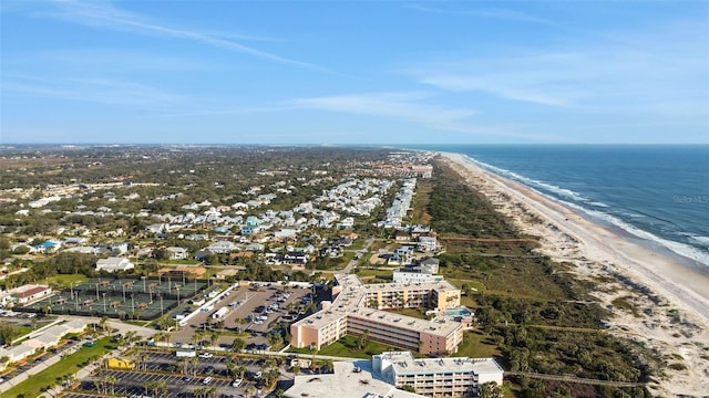 bird's eye view with a water view and a view of the beach