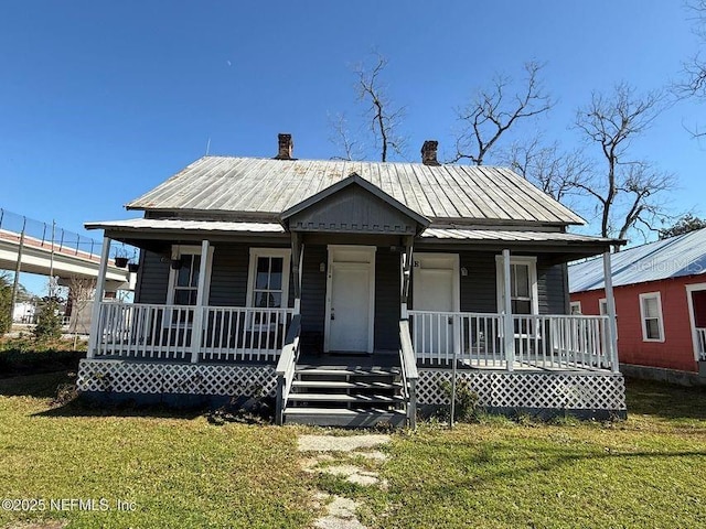 bungalow-style house featuring a front yard and a porch